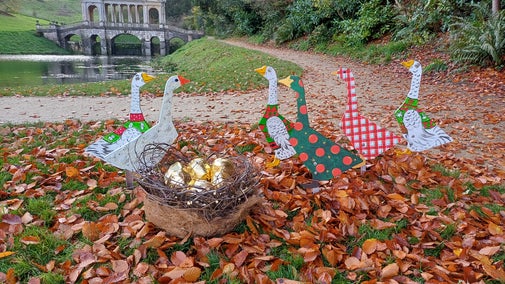 Six geese-a-laying in front of the Palladian bridge at Prior Park, for the 12 Days of Christmas trail at Prior Park